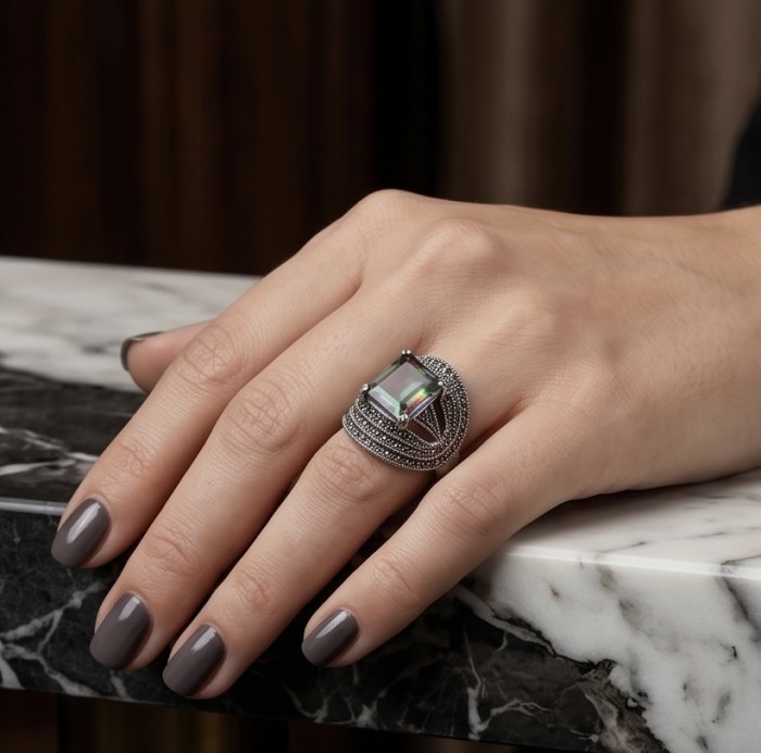 Big Dreamer Massive 17.8 carat Mystic Topaz .925 Sterling Silver handcrafted Large ring size 8 - Mystic topaz ring on hand, angled view, 17.8 carat on sterling silver.