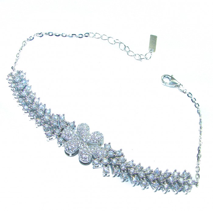 Natural 32.5 carat White Topaz .925 Sterling Silver handmade Statement Bracelet - Bracelet side view with white topaz stones and floral center detail.