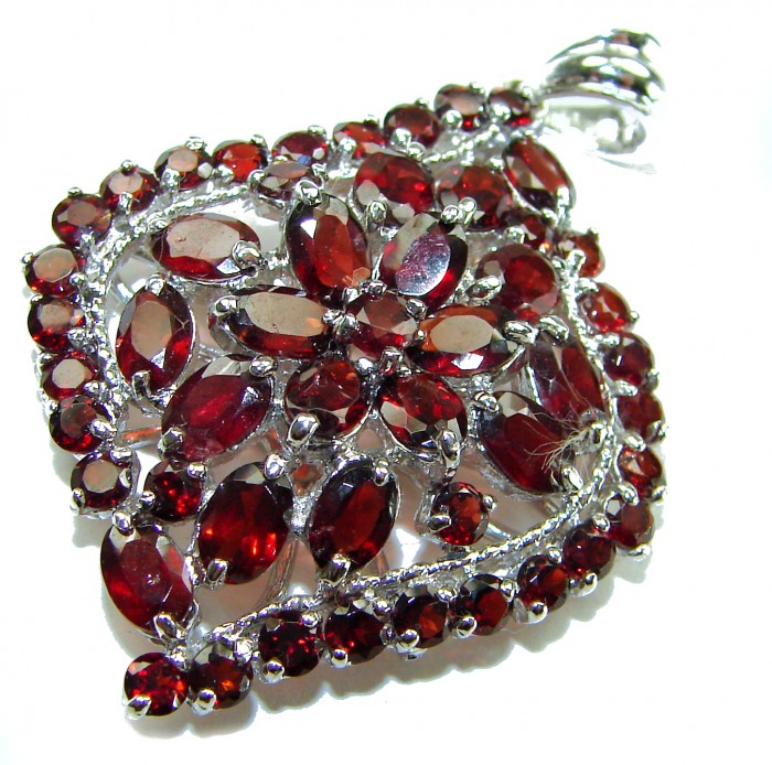 Marvelous Natural 33.8 carat Mozambique Garnet .925 Sterling Silver Handcrafted pendant - Close-up of garnet pendant in sterling silver setting.