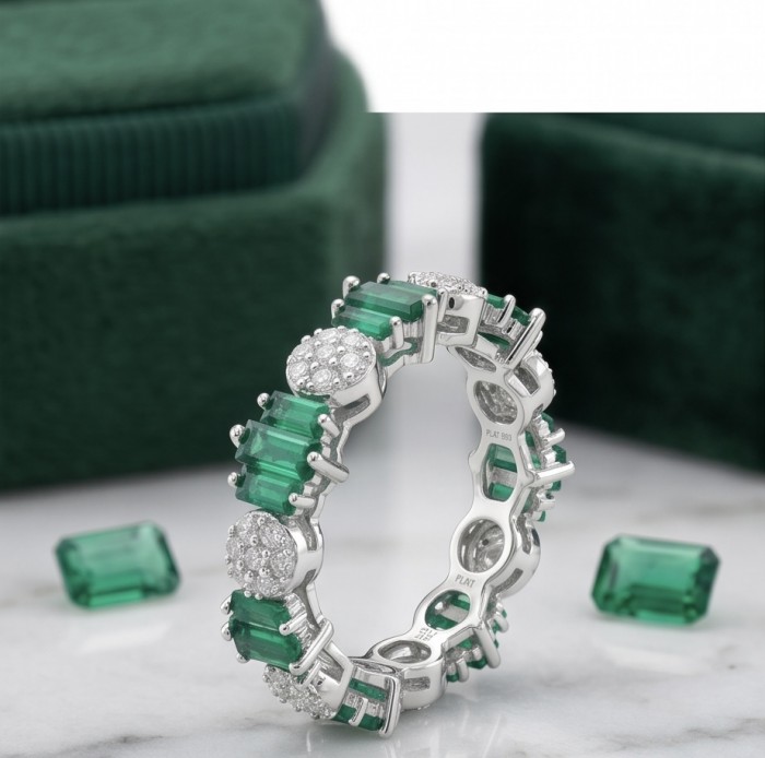 Art Deco 6.7 carat Emerald .925 Sterling Silver handcrafted Ring size 6 1/2 - Side view of Art Deco emerald sterling silver ring with green box.