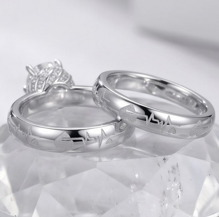 Aphrodite - 4.8 carat White Topaz Silver tone handcrafted stack up ring size 7 - Side view of silver rings with heartbeat and heart engravings.