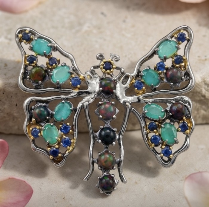 Incredible Butterfly Natural Black Opal Colombian Emerald 2 tones .925 Sterling Silver dippedin black rhodium handcrafted Brooch - Butterfly brooch with opals and emeralds, front view.