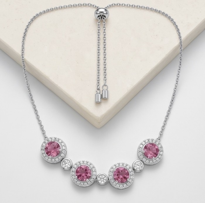 Serenade authentic 12.5 carat Brazilian Pink Topaz rhodium over .925 Sterling Silver handcrafted necklace - Necklace with pink topaz stones, frontal view on a neutral background.