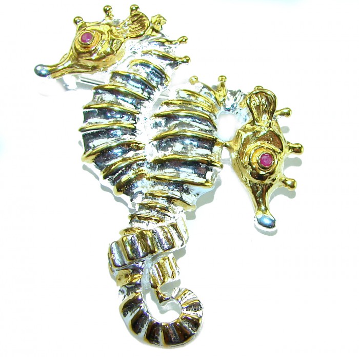 Two Seahorses Excellent 0.5 carat Ruby 14K Gold over .925 Sterling Silver handcrafted Pendant Brooch - Seahorse brooch with rubies, silver and gold accents, top view.