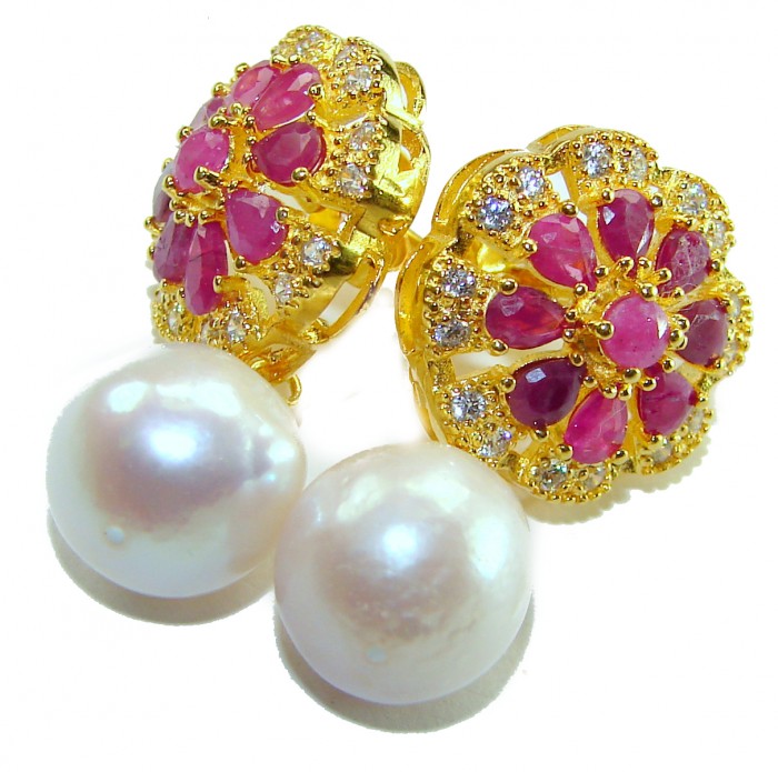 Born to Glam authentic 15.2 carat Ruby Pearl 18K Gold over .925 Sterling Silver handcrafted earrings - Close-up of Born to Glam ruby and pearl earrings in gold setting.