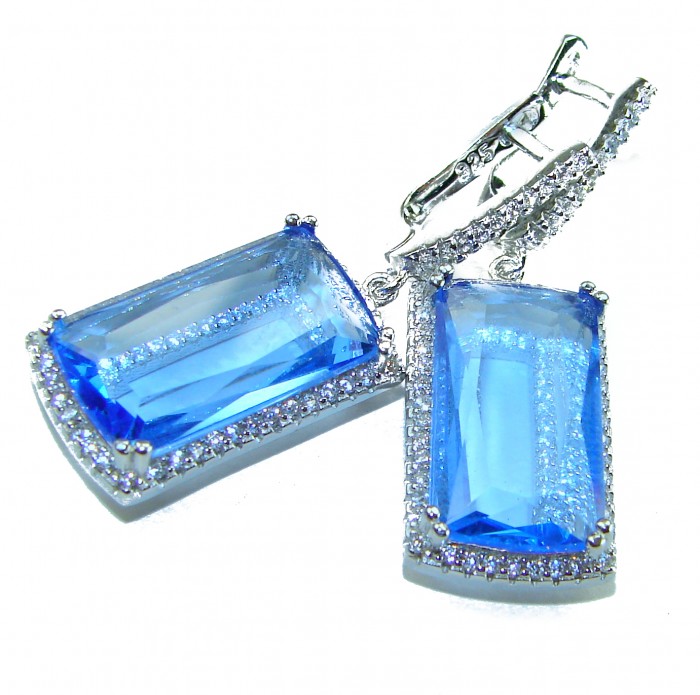 Eau Pure 14.5 carat Swiss Blue Topaz .925 Sterling Silver Handcrafted Earrings - Swiss Blue Topaz earrings, stone close-up, on white background.