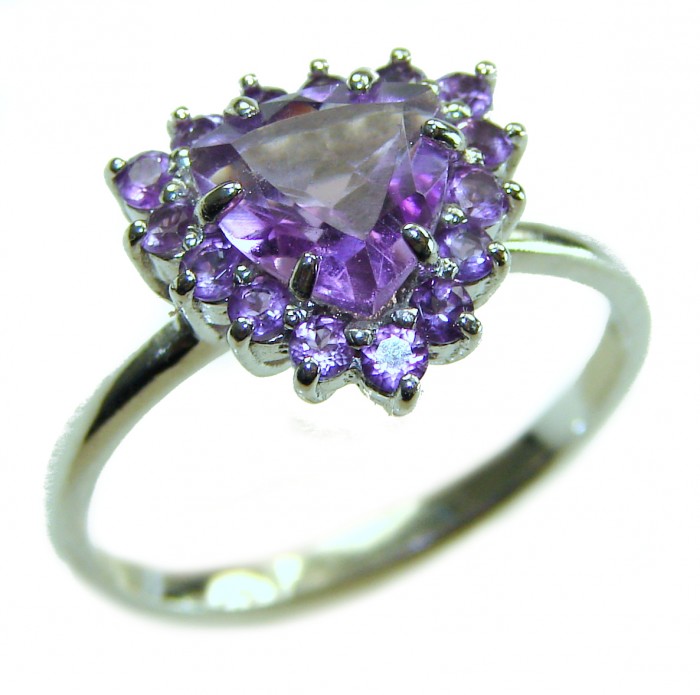 Purple Queen trillion cut 8.2 carat Amethyst .925 Sterling Silver Handcrafted Ring size 9 - Close-up of Purple Queen trillion cut amethyst ring on white background.