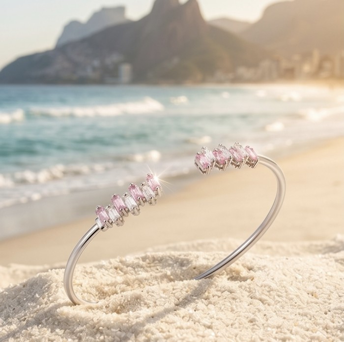 Precious Light Natural 6.8 carat Pink Topaz .925 Sterling Silver bracelet - Pink Topaz bracelet on beach, side view, 6.8 carat, .925 Sterling Silver
