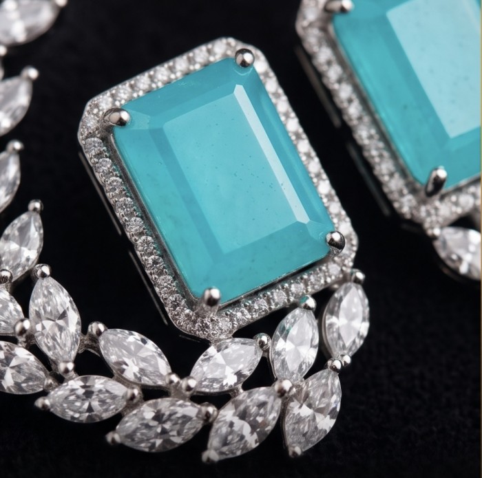 Royalty 4.2 carat Paraiba Tourmaline .925 Sterling Silver entirely handmade earrings - Close-up of Royalty 4.2ct Paraiba Tourmaline in sterling silver setting.