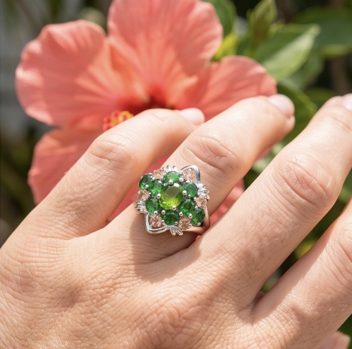 4.8 carat authentic Tsavorite Garnet .925 Sterling Silver handcrafted Statement Ring s. 7 1/2 - Tsavorite garnet ring in sterling silver worn on hand, pink flower background.