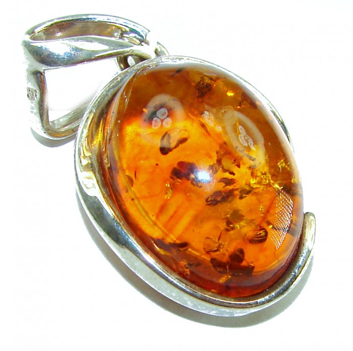 Prehistoric Authentic Baltic Amber .925 Sterling Silver beautifully handcrafted Pendant - Close-up of Baltic amber stone in sterling silver setting