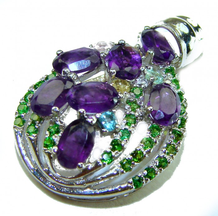 Mademoiselle - 14.2 carat Amethyst .925 Sterling Silver handcrafted Pendant - Amethyst pendant top view with green stone accents.