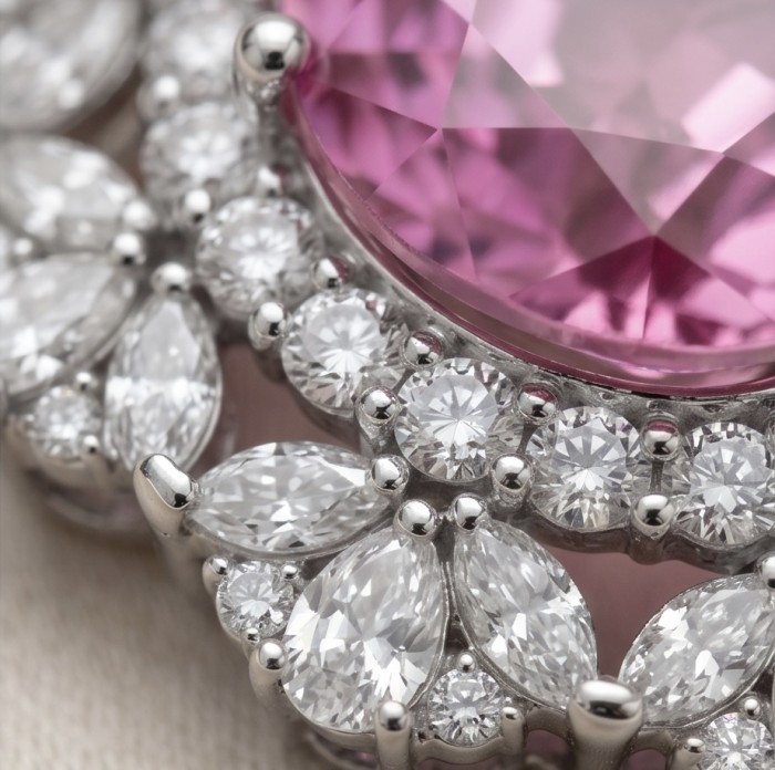 Incredible oval cut 18.8 carat Pink Sapphire .925 Sterling Silver handcrafted pendant - Close-up of oval pink sapphire with diamond accents in sterling setting