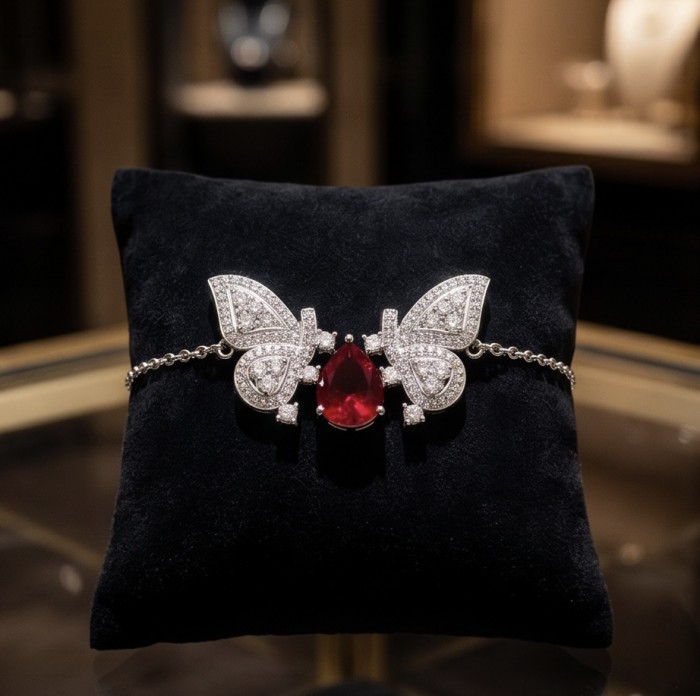 Giovanna - Magnificent Jewel 5.2 carat Ruby .925 Sterling Silver handcrafted incredible Statement Bracelet - Butterfly design bracelet with 5.2 carat ruby on display pillow.