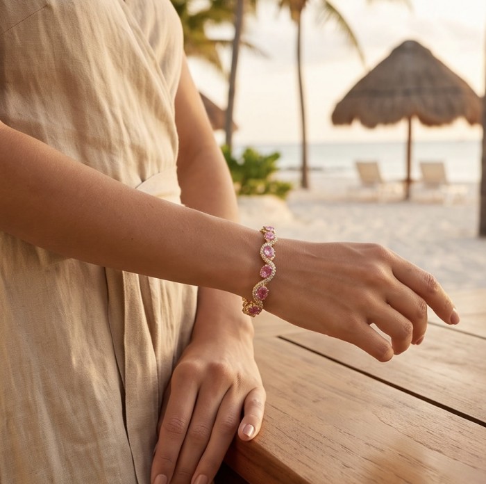 Luxurious 31.4 carat Pink Sapphire .925 Sterling Silver dipped in 18K Gold handcrafted Bracelet - Pink sapphire bracelet worn on wrist, beach background