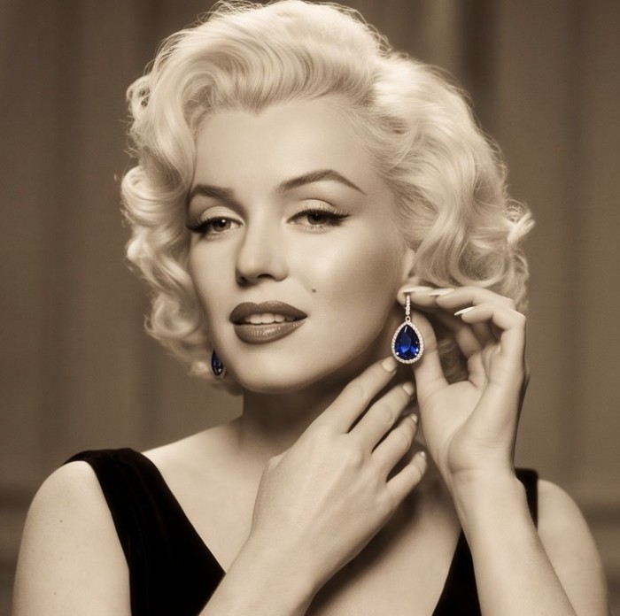 Vintage style - Marlyn - pear cut 14.9 carat Sapphire .925 Sterling Silver handcrafted earrings - Woman wearing vintage-style pear cut Sapphire earrings.
