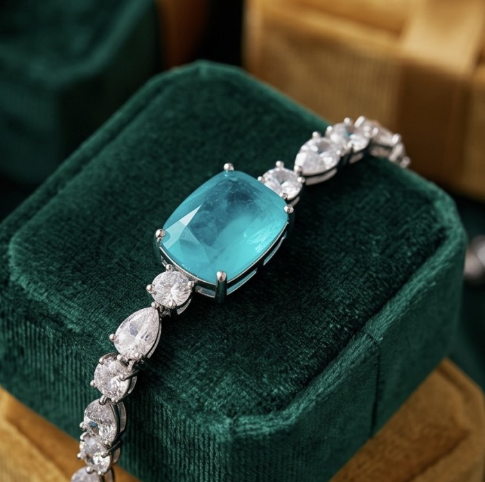 Ofelia - Authentic 9.5 CARAT natural Colombian Emerald 12.2 Moissanite .925 Sterling Silver handcrafted Statement bracelet - Close-up of Ofelia bracelet with emerald and diamonds on velvet box