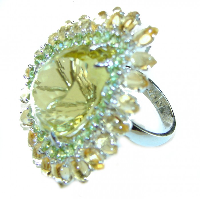 Andalusia 45.5 carat Authentic Citrine Peridot .925 Sterling Silver handcrafted Statement ring size 6 3/4 - Close-up angle of Andalusia Citrine and Peridot ring on white background