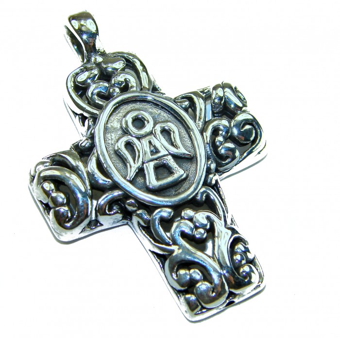 Protective angel - Holy Cross .925 Sterling Silver Pendant - Decorative sterling silver cross pendant, angle showing detailed carvings.