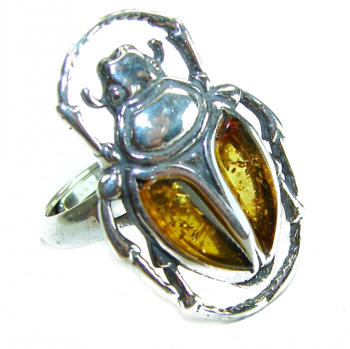 Rainbow Moonstone .925 Sterling Silver handmade ring s. 7 adjustable - Beetle-shaped sterling silver ring with amber details, top view.