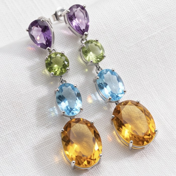 Tropical Islands 41.7 carat Swiss Blue Topaz RHODIUM OVER .925 Sterling Silver Handcrafted LARGE Statement earrings - Colorful gemstone earrings close-up on white fabric background