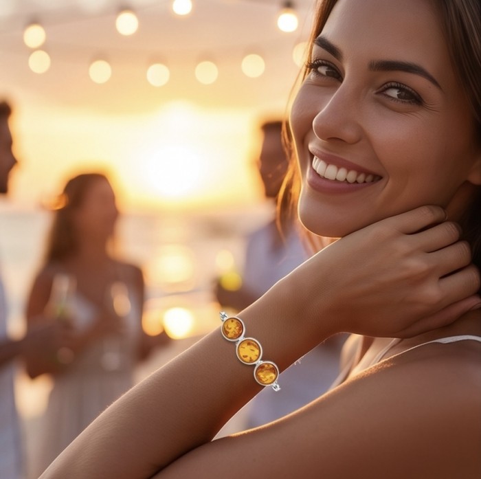 Excellent Baltic Amber .925 Sterling Silver entirely handcrafted Bracelet - Woman wearing Baltic Amber bracelet at sunset event.
