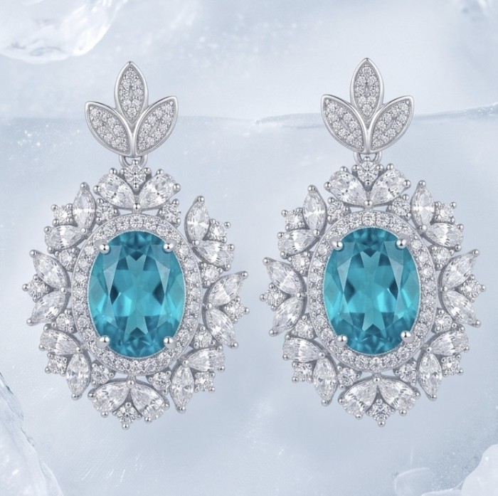 Royalty oval cut 7.2 carat Paraiba Tourmaline .925 Sterling Silver entirely handmade earrings - Elegant earrings, front view showcasing Paraiba Tourmaline and diamonds.