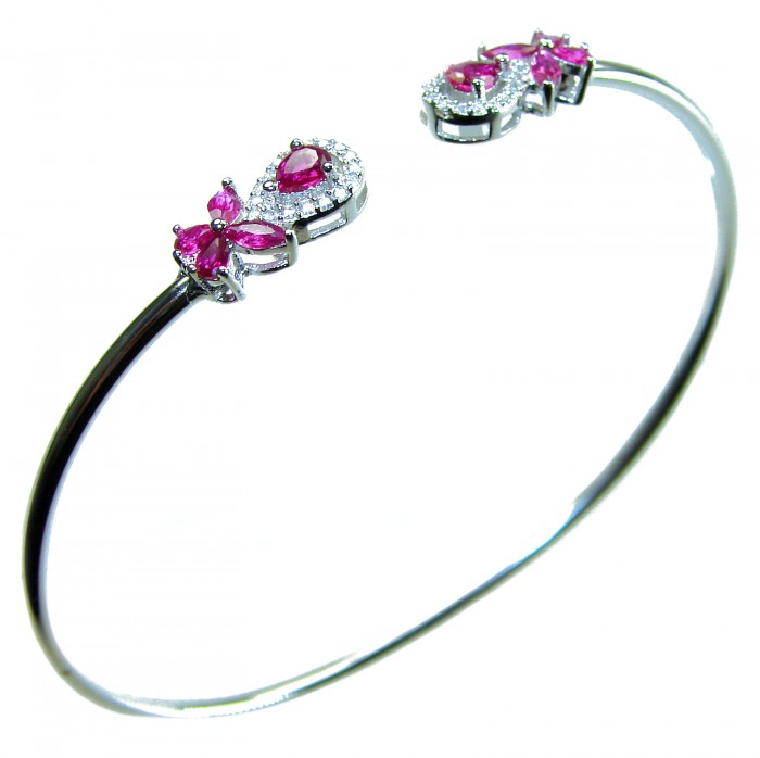 Giovanna 7.2 carat Mozambique Ruby .925 Sterling Silver .925 Sterling Silver dipped in rhodium Statement Bracelet - Ruby bracelet close-up, showcasing stones and details.