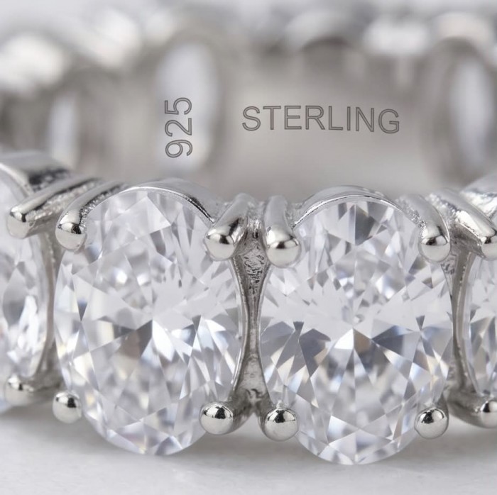 Luxurious 6.5 carat White Topaz .925 Sterling Silver infinity ring size 6 3/4 - Close-up of white topaz stones on .925 sterling silver ring.