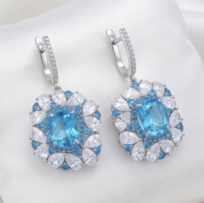 Atlantica 19.7 carat Genuine Aquamarine RHODIUM OVER .925 Sterling Silver Handcrafted Statement earrings - Close-up of Atlantica aquamarine earrings with white and blue stones