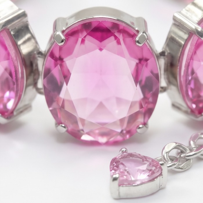 Luxurious 158.4 carat Fuchsia Pink Sapphire .925 Sterling Silver handcrafted Bracelet - Close-up of luxurious fuchsia pink sapphire in sterling silver setting.