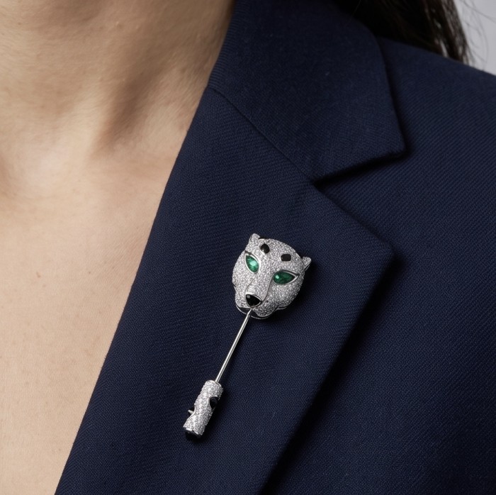 Precious Gaphard Natural 0.5 carat Emerlad black enamel .925 Sterling Silver handcrafted Brooch - Emerald panther brooch on navy suit, angled front view