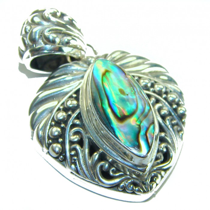 Gift of the Sea Natural Rainbow Abalone .925 Sterling Silver handmade Pendant - Abalone pendant close-up with intricate silver detailing.