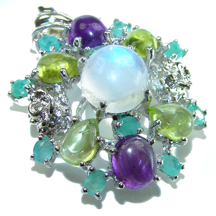 Genuine 6.2 carat Fire Moonstone .925 Sterling Silver handcrafted pendant - Close-up of multicolored gemstone brooch in sterling silver.