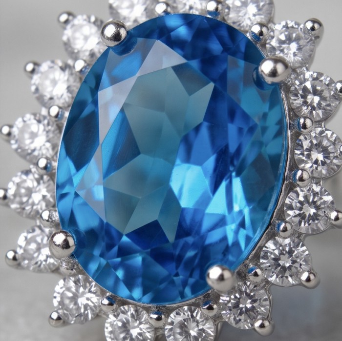Atlantica 8.7 carat Swiss Blue Topaz .925 Sterling Silver Handcrafted earrings - Close-up of Atlantica 8.7 carat Swiss Blue Topaz ring with diamonds