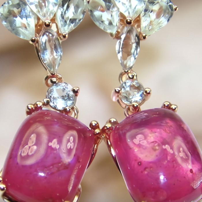 Maria Rosa - Magnificent Jewel 12.5 carat Mozambique Ruby .925 Sterling Silver dipped in 22K Rose Gold handcrafted earrings - Close-up of 12.5 carat Mozambique Ruby earrings with sparkling stones.