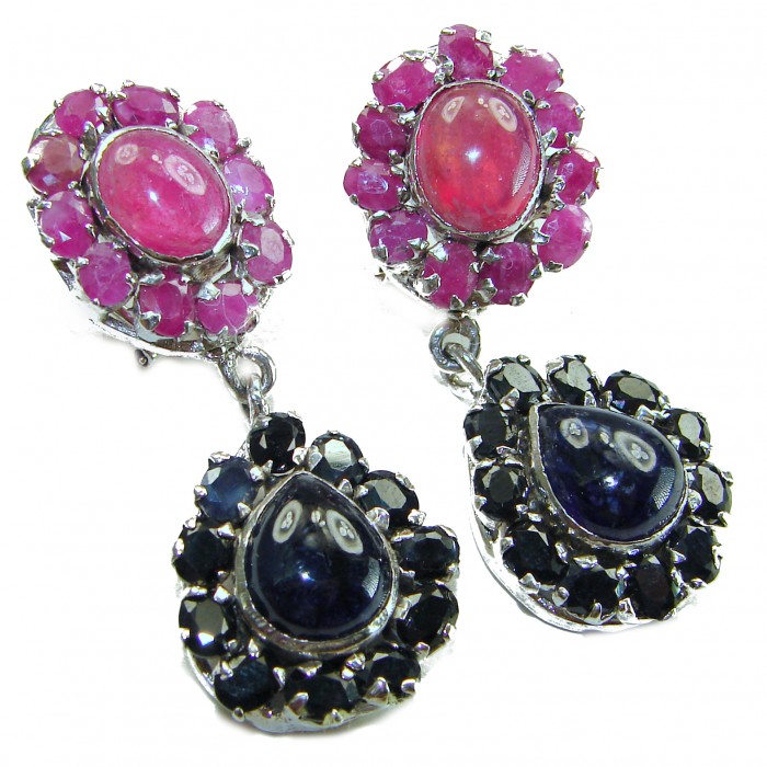 Giovanna - Very Unique - 29.5 carat Sapphire Ruby .925 Sterling Silver dipped in rhodium handcrafted earrings - Close-up of sapphire and ruby drop earrings with silver setting.