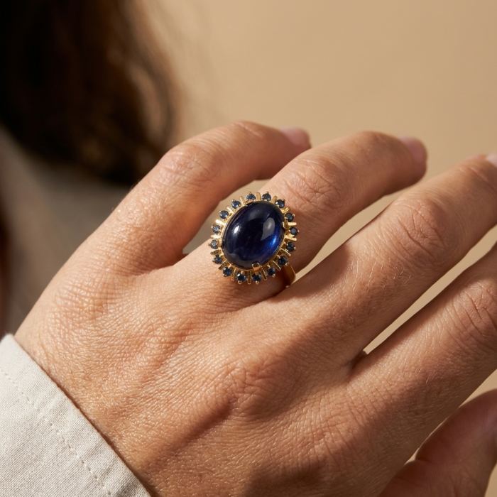 Authentic 14.5 carat Brazilain Kyanite 2.1 carat rare Grandidierite .925 Sterling Silver dipped in 22K Gold handcrafted Ring size 7 1/4 - Kyanite and Grandi ring worn on hand, close-up view.