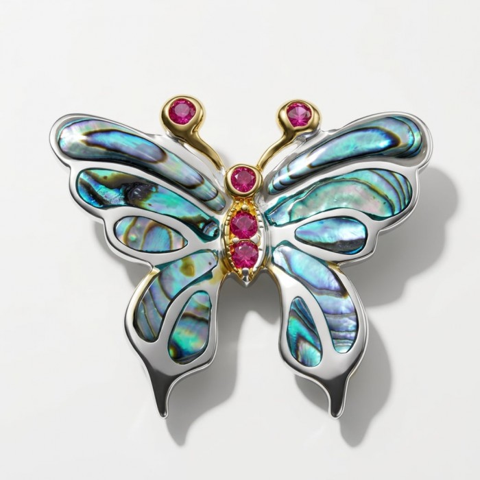 BUTTERFLY Natural Rainbow Abalone .925 Sterling Silver handmade Pendant - Butterfly brooch with rainbow abalone, ruby accents, silver base, top view.