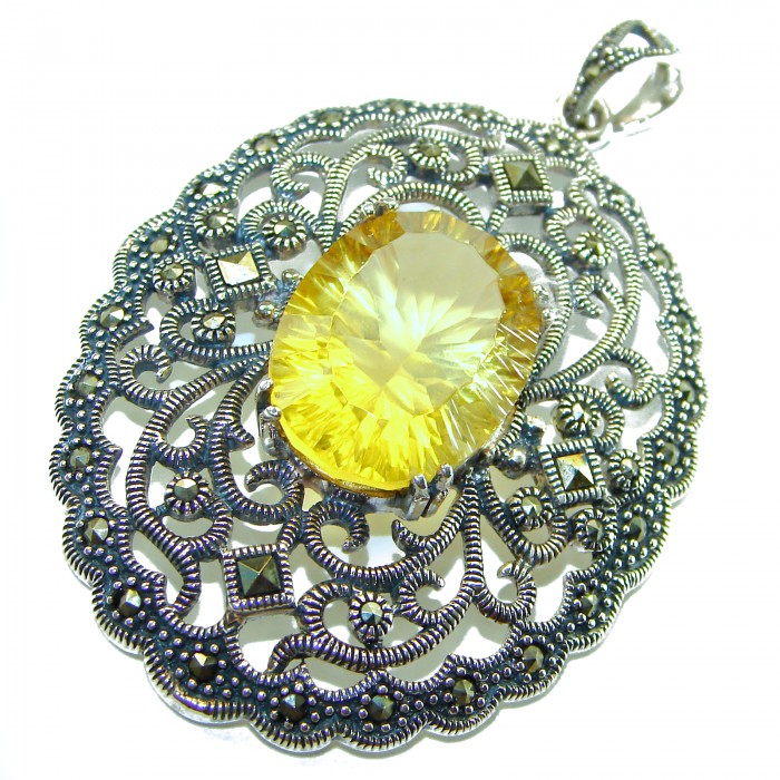 Luxury genuine 19.5 CARAT oval cut Golden Topaz .925 Sterling Silver handmade Pendant - Close-up of oval-cut golden topaz pendant with ornate silver detailing.