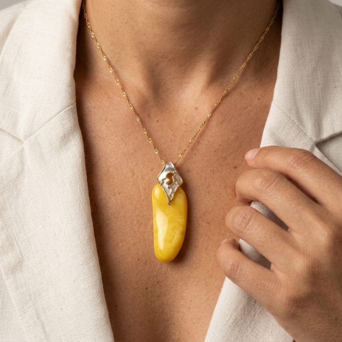 Sea Treasure Prehistoric Authentic Butterscotch Baltic Amber 2 tones .925 Sterling Silver beautifully handcrafted Huge Pendant - Amber pendant necklace worn close-up on neck.