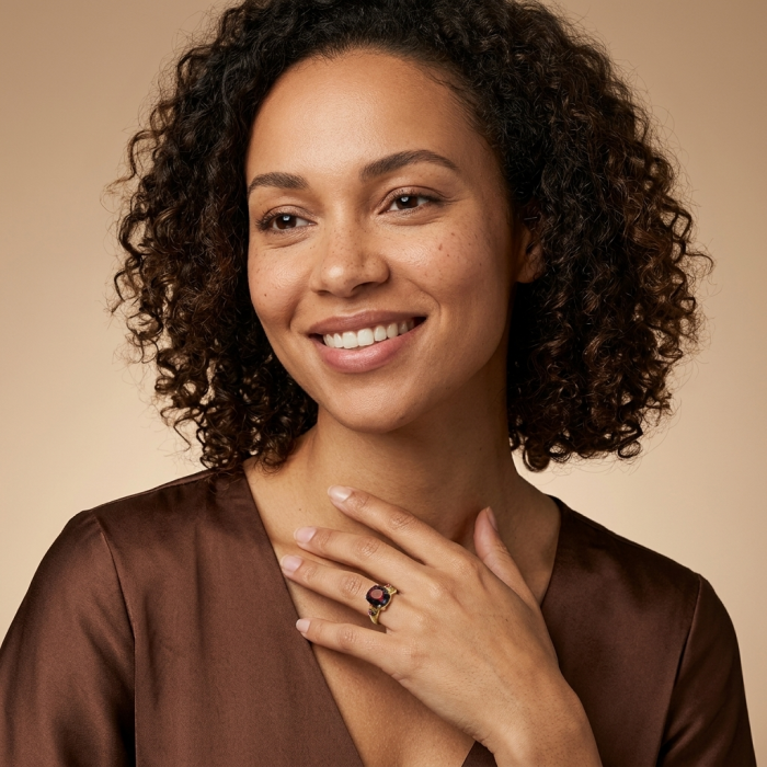 Passion 10.5 carat round cut Red Garnet .925 Sterling Silver handcrafted ring; s. 6 1/2 - Woman wearing Passion 10.5ct round red garnet ring, smiling softly