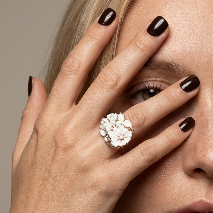 Exquisite Flowers oval Cameo Shell 18K Gold over .925 Sterling Silver handcrafted Made in Italy Statement ring; s. 7 ADJUSTABLE - Ring with floral cameo worn on hand, dark polished nails.