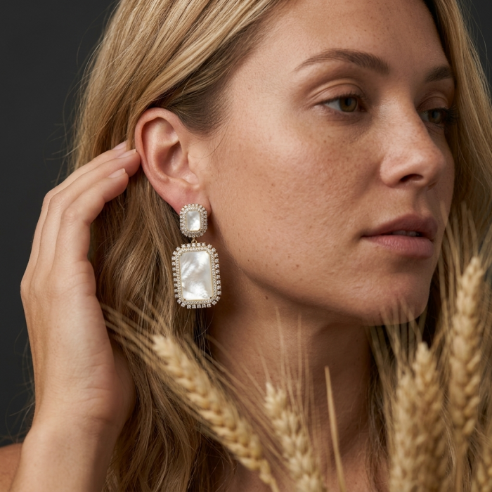 Genuine Blister Pearl lab grown Diamond 18K Gold over .925 Sterling Silver handcrafted Large Statement Earrings - Side view of blister pearl earrings worn on person.