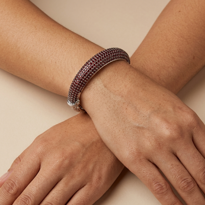 Dolce Vita - Precious Natural 42.5 carat Mozambique Garnet rhodium over .925 Sterling Silver handcrafted bracelet - Garnet bracelet worn on wrist, top view.