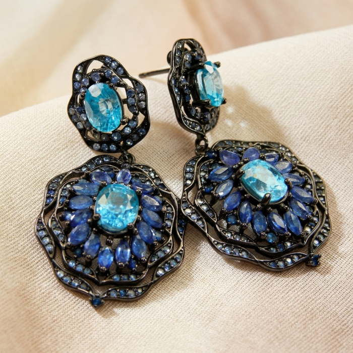 Atlantica 4.7 carat Swiss Blue Topaz .925 Sterling Silver dipped in black rhodium Handcrafted Statement earrings - Close-up of Atlantica Swiss Blue Topaz sterling silver earrings.
