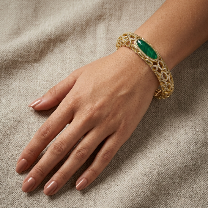Luxurious Genuine 11.5 carat Jade 18K Gold over .925 Sterling Silver handmade Bracelet - Gold jade bracelet worn on hand, top view showing detail.