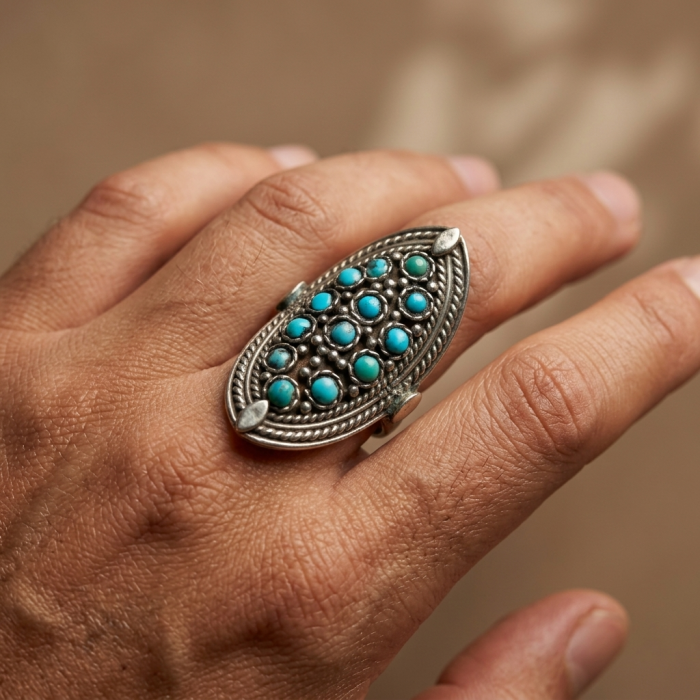Rare authentic Turquoise .925 Sterling Silver handcrafted Large ring; s. 9 - Turquoise oval ring in sterling silver worn on hand, top view.