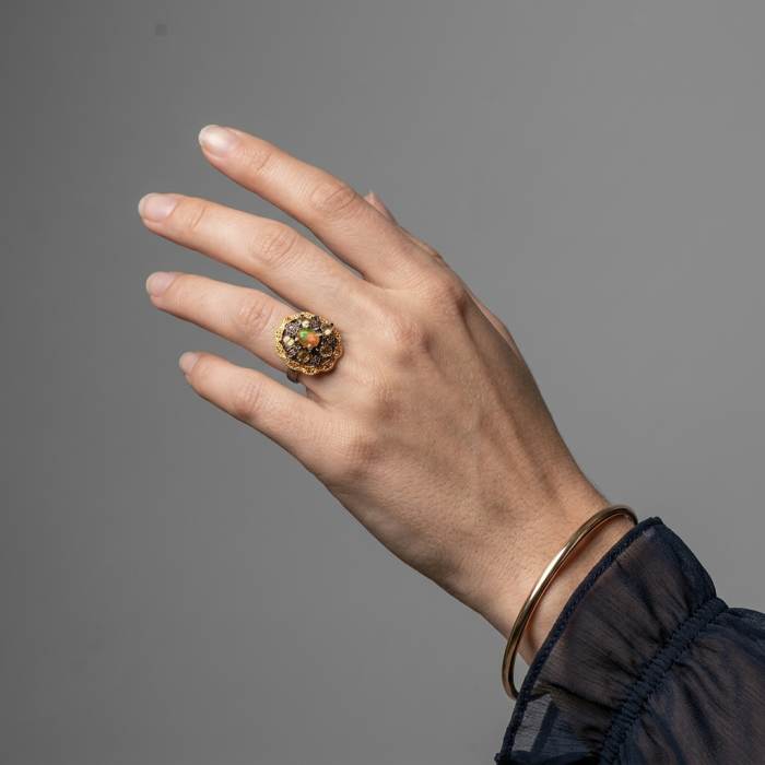 Queen of Fire best quality 2.8carat Mexican Opal 18K Gold black rhodium over .925 Sterling Silver handmade ring 7 1/4 - Mexican Opal ring in 18K gold, worn on hand, side view
