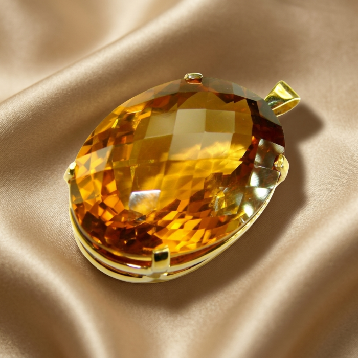 Luxury genuine 37.9 CARAT oval cut Champagne Topaz .925 Sterling Silver dipped in 22K Gold handmade Pendant - Close-up of luxury 37.9 carat oval cut champagne topaz pendant.